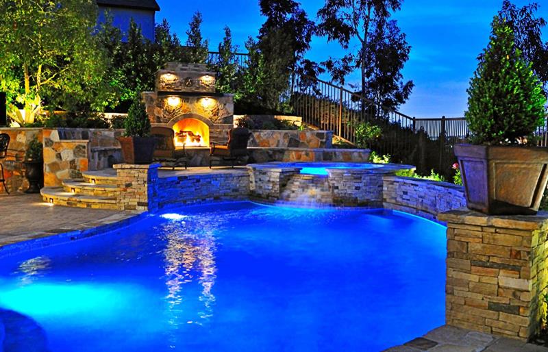 These amazing in-ground pools are not only for design and landscaping purposes: they are also for relaxation, too. [Image Credit: Home Epiphany]